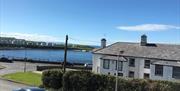 exterior of Wee Duff self-catering accommodation with the sea in the background