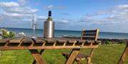 Outdoor seating with view to the sea