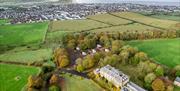 aerial view of Cromore estate and Cromore house with seaside in view