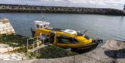 Curiosity boat sitting in Carlough harbour.