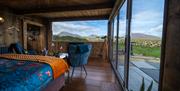 Interior of Cabin showing view of Mourne Mountains Ireland