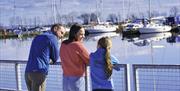 Family looking at the boats at Ballyronan Marina