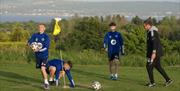 Newtownabbey Footgolf boys and coach on the green