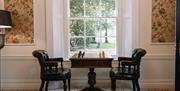 Lounge area of Linen Merchants Residence at Galgorm. Lounge area overlooks expansive gardens