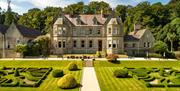 Magherarmorne Estate gardens with house to the rear