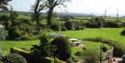 Image showing beautiful surrounding landscape and garden seating area