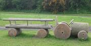 A log tractor with a trailer.