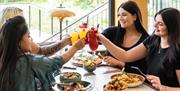 Girls with Cocktails and Food