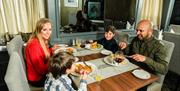 A family having a meal in the Glenavon Hotel