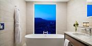 A bath with a view overlooking Belfast City from the Grand Central Hotel