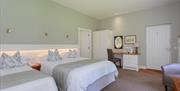 interior of double bedroom at Brown Trout's Cottage suites