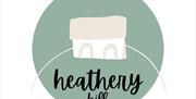 Images shows logo of heathery hill which is a small house within a green circle