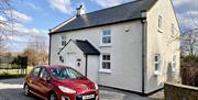 Car parking in front of Shamrock Cottage near Kesh Co. Fermanagh.