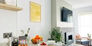 interior of open plan kitchen and living space at Skerries Apartment