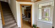 single bed, wardrobe, bedside table, countryside view