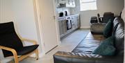 Living area looking onto kitchen