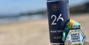 Giants Causeway Coast Marathon event beer and medal