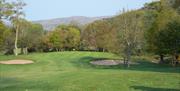 Approaching the 3rd green with Mourne Mountains in the background.