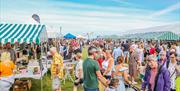 Crowds browsing the stalls and soaking up the atmosphere at the Naturally North Coast and Glens Artisan Market