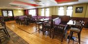 dining area with several tables and chairs