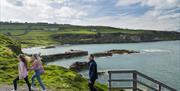 Family walking around Portmuck Harbour