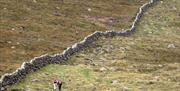 2 walkers on the Mourne Mountains