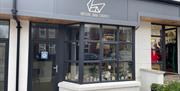 Black and white exterior premises of Natasha Swan Ceramics with window display