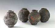 textured pots made with local clay  by Patricia Millar