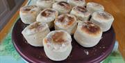 Bakes dozen - round potato bread on an electric griddle