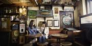 Two ladies sitting at table in Peadar O'Donnells