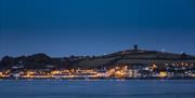 Photo of Windmill Hill and Portaferry lit in the evening