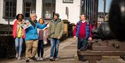 Group on a walking tour with guide David from Derrie Danders