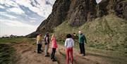 Guide Rodney talking to the group as part of the Cavehill Walking Tour with Experience and Explore