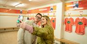 Couple taking a selfie in the changing rooms at Armagh GAA