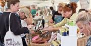 Customers browsing the stalls at the Naturally North Coast and Glens Artisan Market