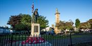 Photo of the Rollo Gillespie Monument standing tall in the centre of Comber Square