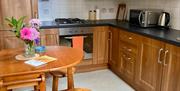 Kitchen with wooden doors
