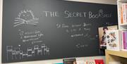 Chalkboard with quotation:  'A room without books is like a body without a soul' Cicero