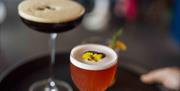 A tray of beautiful cocktails is served during the Sensorium experience