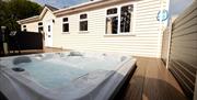 hot tub on decking at caravan