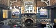 Interior view of the fireplae area withing the Stables Restaurant Groomsport