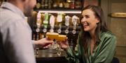 Couple having a cocktail at The Copper Tap