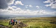 Walking group stop to take in the incredible views