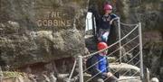 a male and female at the entrance of the Gobbins Cliff path