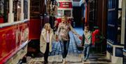 A family enjoying the Transport Museum exhibit