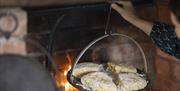 Irish Soda Farls on a traditional griddle