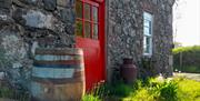 Front view of a restored farm cottage