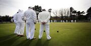 Photo of bowlers in action at the Ward Park Bowling Green