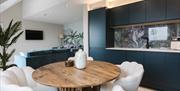 interior of open plan kitchen, dining and living space at DB Stays 'The Nest'