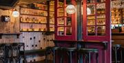 Bar seating area of The Wild Hare, the Avoca Hotel's Gin Bar.